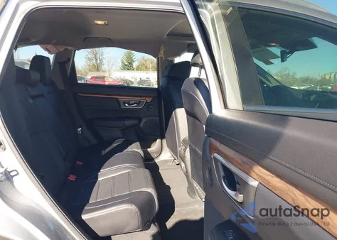 2018 Honda Cr-V Touring z USA, uszkodzony, nr VIN 7FARW2H94JE058771